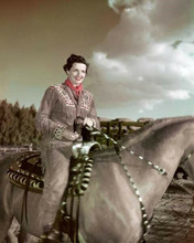 Gail Russell wears fringe buckskin outfit on horseback 1940's 8x10 inch photo