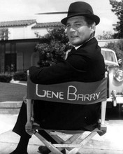 Gene Barry relaxes in studio chair on set Burke's Law TV series 8x10 inch photo
