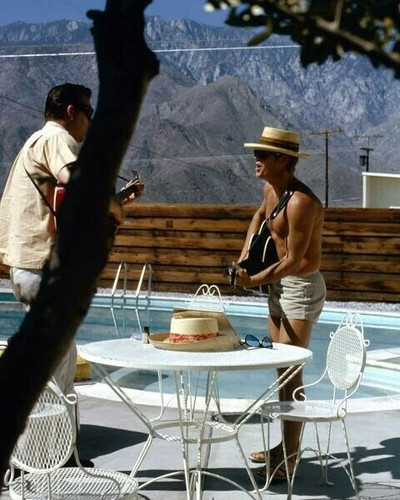 Steve McQueen bare chested playing guitar in back yard by pool 8x10 ...