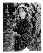 Corey Feldman wears Hawaiian shirt holding spear 8x10 inch vintage photo