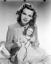 Judy Garland rare young pose holding Judy Garland doll 8x10 inch photo