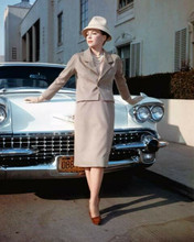 Leslie Caron poses in front of 1950's white Cadillac 8x10 inch photo