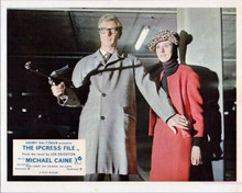 The Ipcress File 8x10 inch photo Michael Caine with machine gun & Sue Lloyd