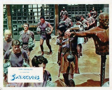 Spartacus 8x10 inch photo Kirk Douglas walks with slaves in arena