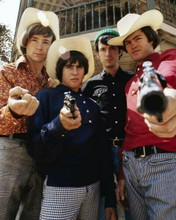 The Monkees Peter Davy Mike & Micky in western hats holding guns 8x10 inch photo