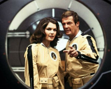 Moonraker lois Chiles & Roger Moore look through space porthole 8x10 inch photo