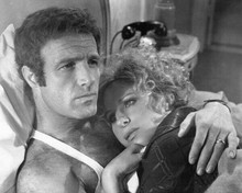 Funny Lady 1975 Barbra Streisand rests head on James Caan chest 8x10 inch photo