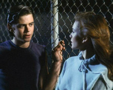 The Outsiders 1983 C.Thomas Howell meets Diane Lane by chain fence 8x10 photo
