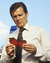 Roger Moore as James Bond holding Tarot cards Live and Let Die 8x10 inch photo