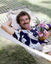 Tom Selleck sits in hammock with Hawaiian cocktail as Magnum 8x10 inch photo