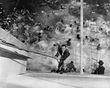 John Wayne climbs up side of capsized ship 1964 Circus World 11x14 inch photo