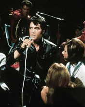 Elvis Presley wears black leather outfit in concert 11x17 Poster