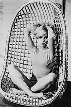 Alexandra Bastedo The Champions swing birdcage chair barefoot 11x17 Mini Poster