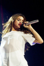 Selena Gomez in White Outfit Sultry Concert Image 11x17 Mini Poster