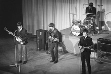 The Beatles 11x17 Mini Poster in concert Ringo on drums Paul John George guitars