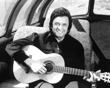 Johnny Cash 16x20 Poster in black shirt playing guitar 1978