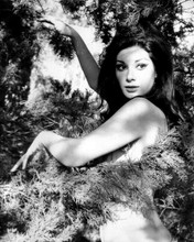 Edwige Fenech poses no clothes on covering herself with tree branch Poster 16x20