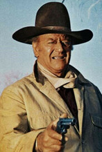 John Wayne wearing big stetson pulls gun Cahill 12x18 inch Poster