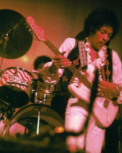 Jimi Hendrix plays guitar in concert by his drummer 8x10 inch photo