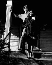 Love Story 1970 Ali MacGraw & Ryan O'Neal stand outside thir house 8x10 photo