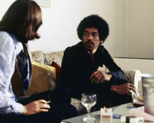 Jimi Hendrix rare backstage in dressing room smoking cigarette 8x10 inch photo