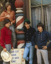 The Monkees TV series the boys pose outside barber shop next to pole 8x10 photo