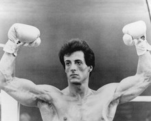 Sylvester Stallone as Rocky holding up his hands in champ pose 8x10 inch photo