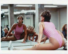 Jamie Lee Curtis in leotard doing work-out in front of mirror 8x10 inch photo