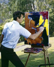 Tony Curtis at work on one of his paintings 1950's in back yard 8x10 inch photo