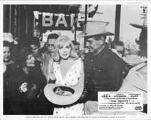 The Misfits Marilyn Monroe with cash in cowboy hat Clark Gable by bar 8x10 photo