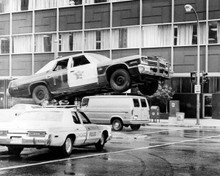 The Blues Brothers Chicago Sheriff's car leaps over police car 8x10 inch photo