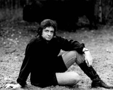 Johnny Cash wears classic black shirt jeans & boots sitting in woods 1970's 8x10