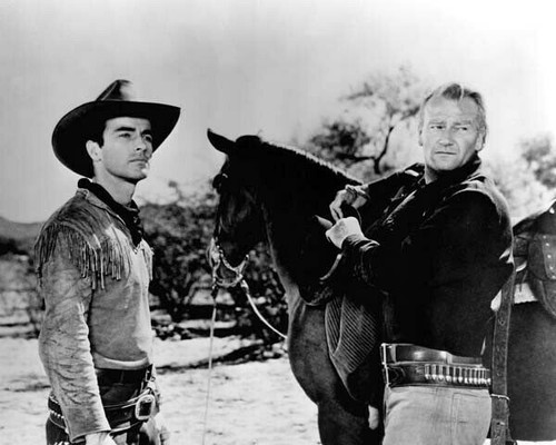 Red River 1948 John Wayne saddles horse with Montgomery Clift 8x10 inch ...