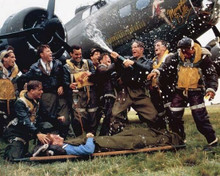 Memphis Belle 1990 crew in front of B-17 letting of champagne 8x10 inch photo