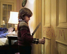 The Shining Danny Lloyd with knife by door Shelley Duvall asleep 8x10 inch photo