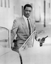 Eddie Murphy holding gun exiting convertable 48 Hours 8x10 inch photo