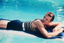 Robert Redford lies in pool on flotation cushion The Great Gatsby 8x10 photo