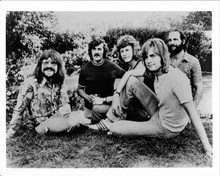 The Moody Blues 1970 pose Hayward Pinder Edge Thomas Lodge sit on grass 8x10