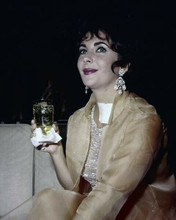 Elizabeth Taylor 1960's off-screen pose sitting holding drink 8x10 inch photo