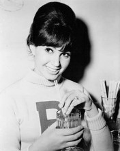 Suzanne Pleshette drinks milkshake wearing cheerleader sweater 8x10 inch photo