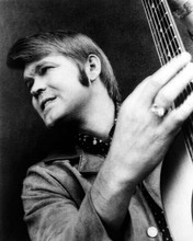 Glen Campbell cool looking 1960's portrait holding up his guitar 8x10 inch photo