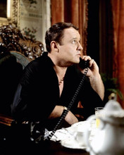 Rod Steiger wears black shirt sat at desk on telephone No Way To Treat A Lady
