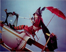 Billie Hayes as Withiepoo flying her vehcile from H.R Pufnstuf TV series