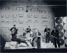 Bill Haley and His Comets on stage Bill plays guitar as band clowns 8x10 photo