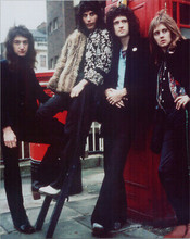 Queen classic 1970's pose outside London phone box Freddie Brian John & Roger