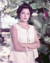 Joan Collins 1950's portrait in sleeveless outfit arms folded 8x10 inch photo