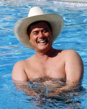 Larry Hagman with classic J.R. smile in pool wearing stetson Dallas 8x10 photo