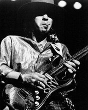 Stevie Ray Vaughan legendary blues rock guitarist smokes plays guitar 8x10 photo