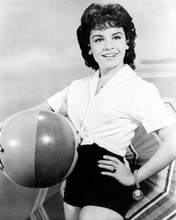 Annette Funicello hold beach ball wearing black shorts & white shirt 8x10 photo