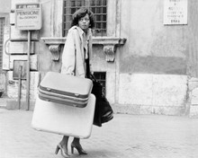 Diana Ross carries her luggage in street 1975 Mahogany 8x10 inch photo